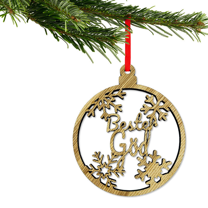 Christbaumkugel aus Holz mit Aufschrift Bester Gödi am festlich geschmückten Christbaum, Christbaumanhänger aus Holz