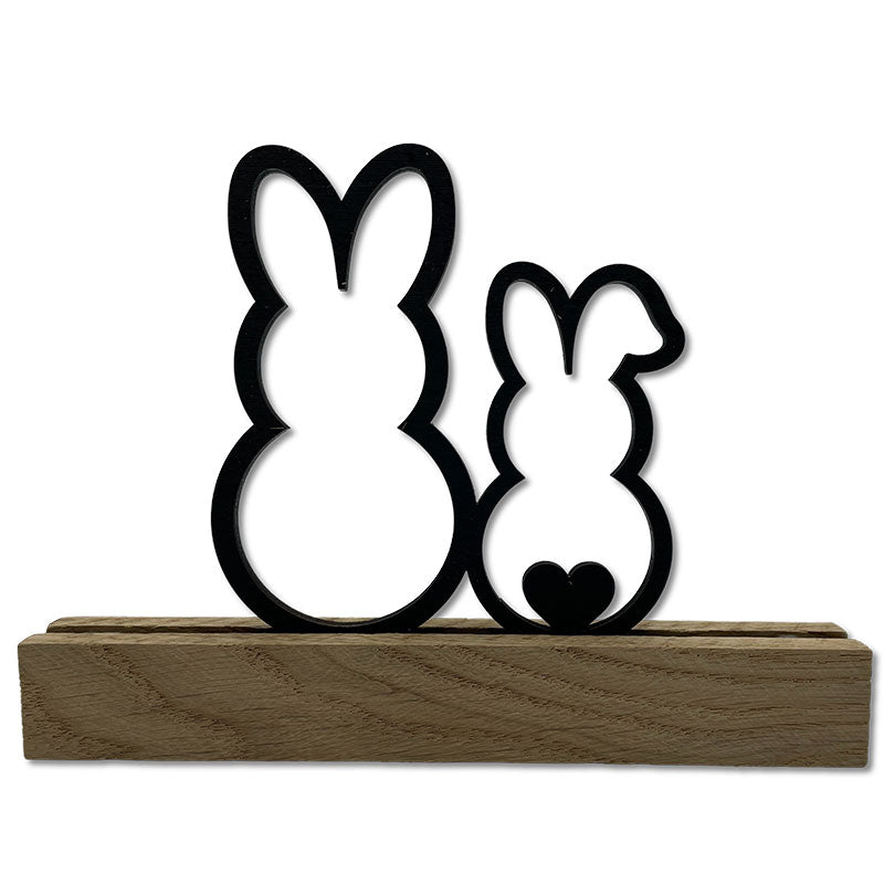 Osteraufsteller zwei Osterhasen schwarz lackiert mit Eichenholz-Sockel - Osterdeko aus Holz