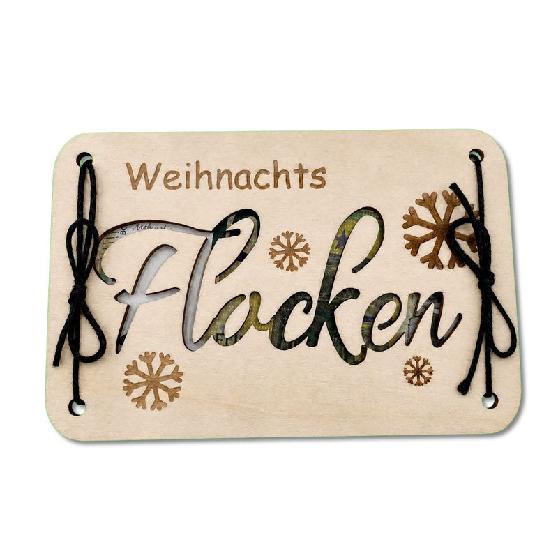 Holzkarte „Weihnachts Flocken“ mit Geldschein hinter dem Schriftzug als Geldgeschenk zu Weihnachten - Wunscherfüller 