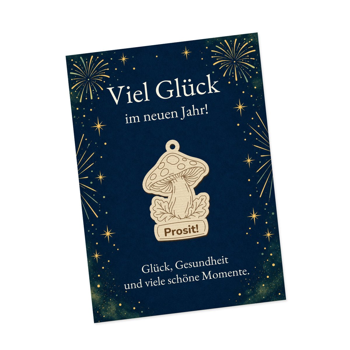 Fliegenpilz mit Blättern und Schriftfeld mit Beschriftung Prosit auf dunkelblauer Karte mit goldfarbenem Feuerwerk